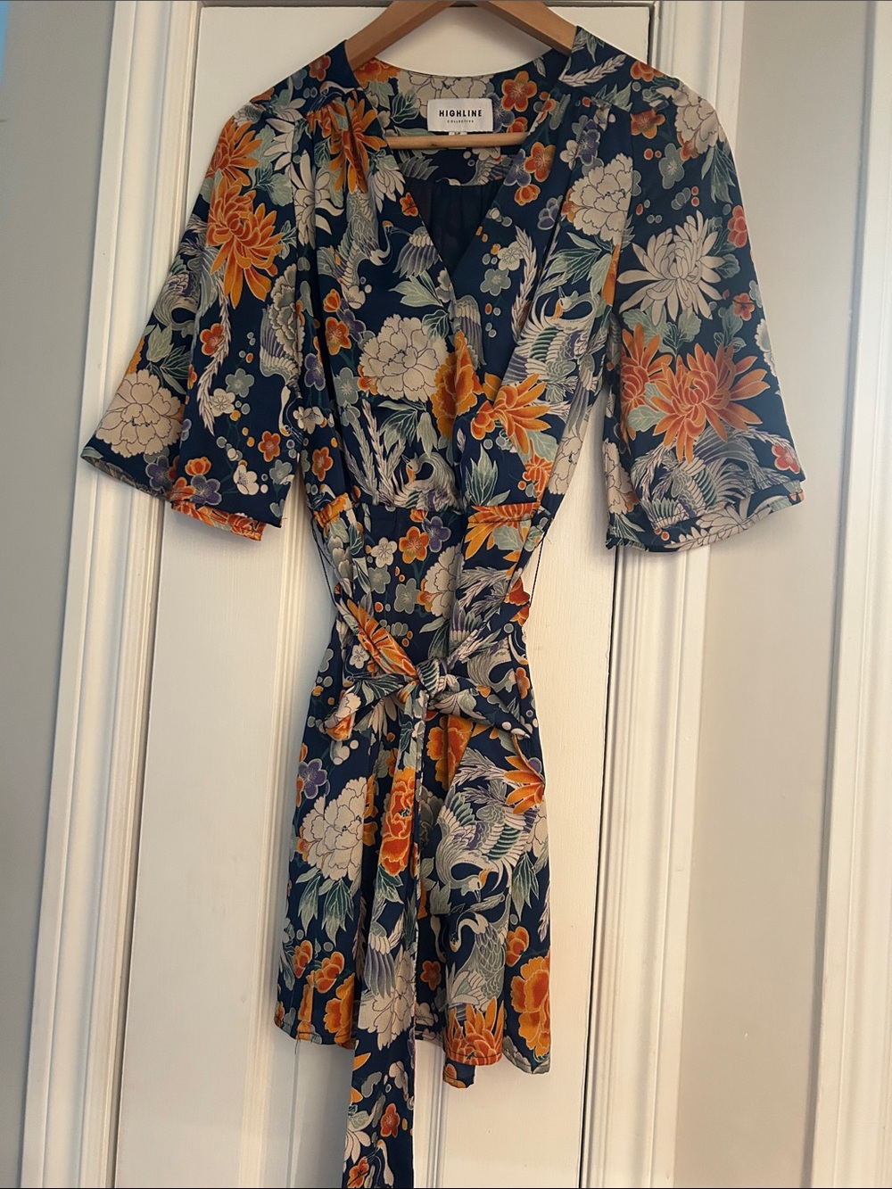 Highline Floral Wrap Dress in Navy with Orange & Cream Flowers